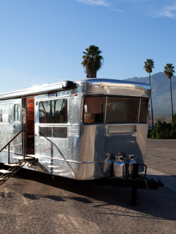 When its not being rented, Hallworths 1955 Spartan aluminum trailer lives in a warehouse in Fillmore.